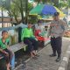 Bhabinkamtibmas Polsek Rangkasbitung Polres Lebak Sambangi Warga di Jalan Kuncoro Jaktim